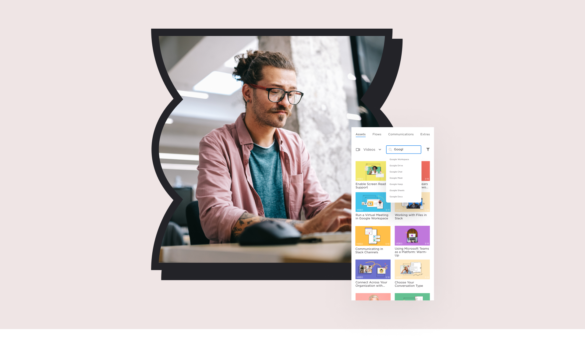 BIPOC man with glasses types on computer.